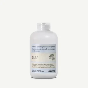 A 250 ml white bottle of Su Hair & Body Wash with a light blue label and black text. - Tyler Mason Salon + Spa in Indianapolis, IN
