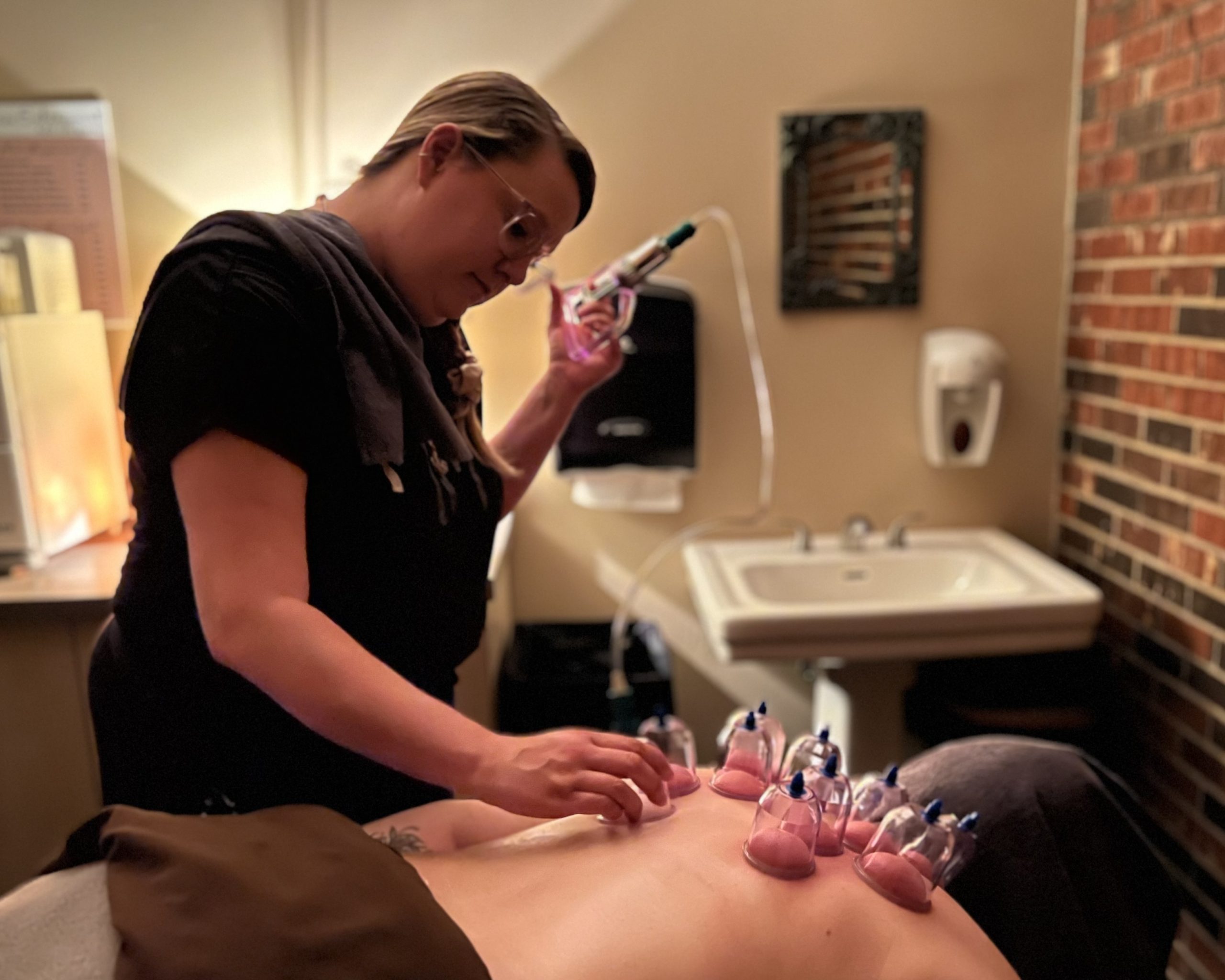 Our Tyler Mason massage therapist Sara relieves her guests' pain, inflammation, lymphedema, and more with cupping therapy.