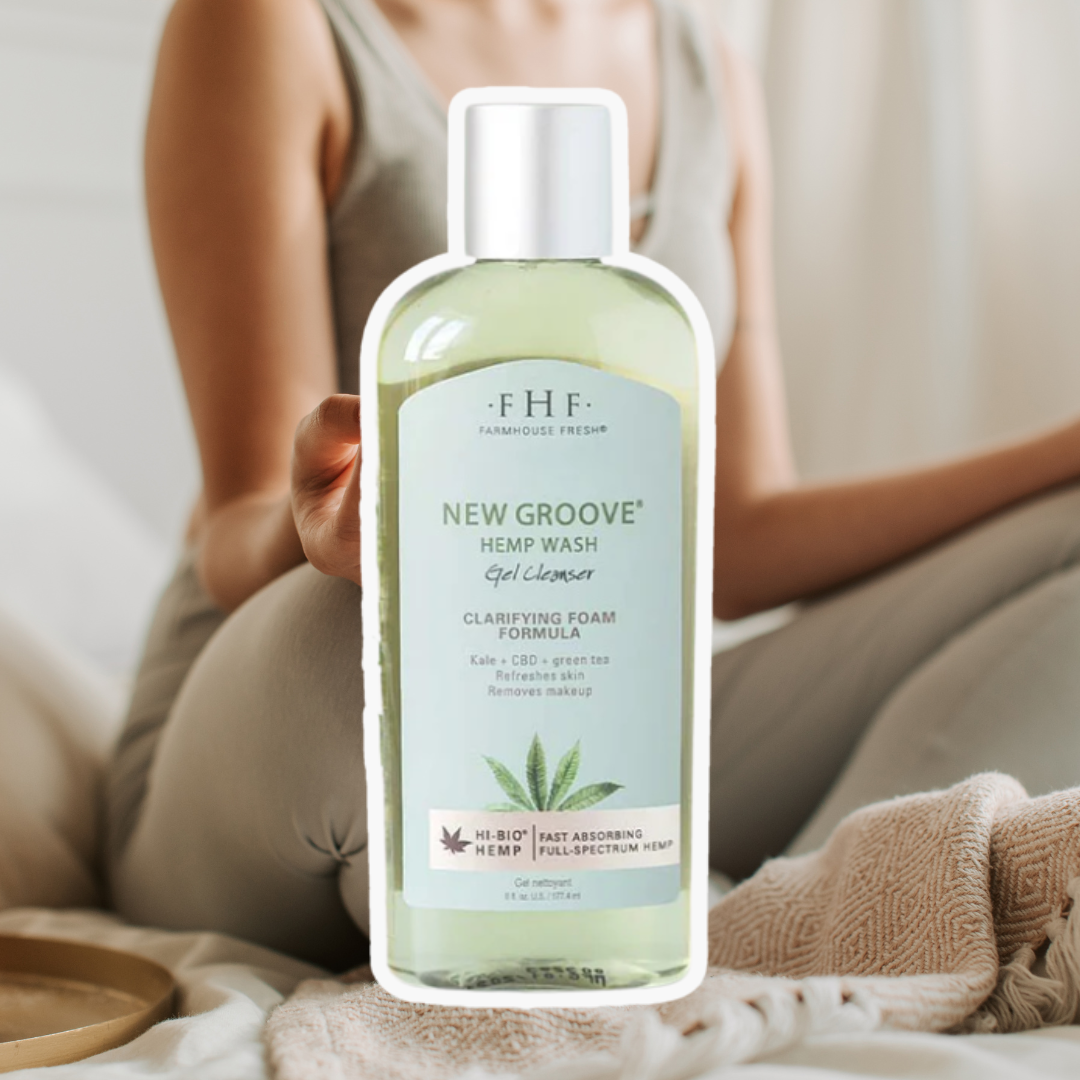 FarmHouse Fresh's New Groove Hemp Wash Gel Cleanser outlined in white, set against a woman meditating during a yoga session.
