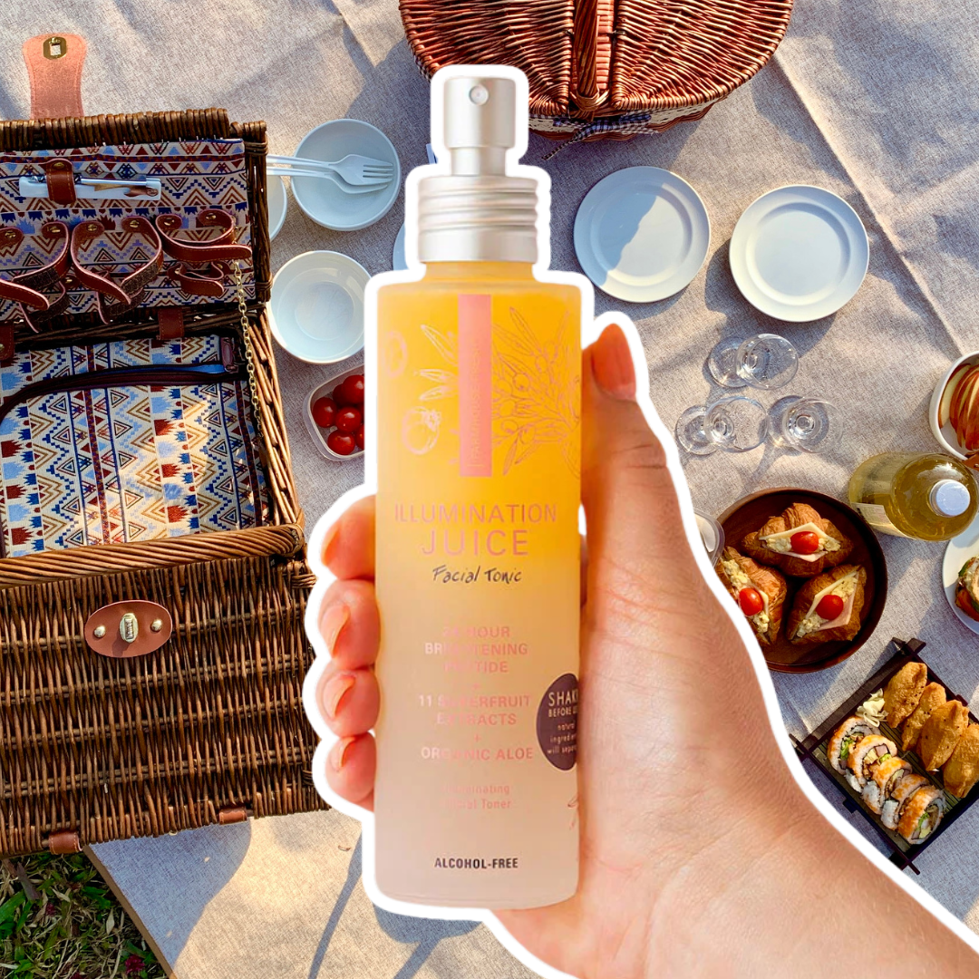 FarmHouse Fresh's Illumination Juice Facial Tonic outlined in white, set against a picnic with juice and croissants. 