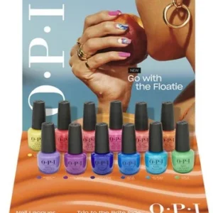 Display of OPIcons Spring 2026 collection, featuring 12 vibrant nail lacquers set against a beach-themed background with a hand holding a striped apple. - Tyler Mason Salon + Spa in Indianapolis, IN